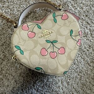 Coach Heart-Shaped Cream Bag with Pink Cherry Design